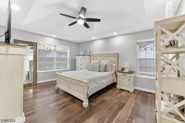 a bed room with a bed and a window