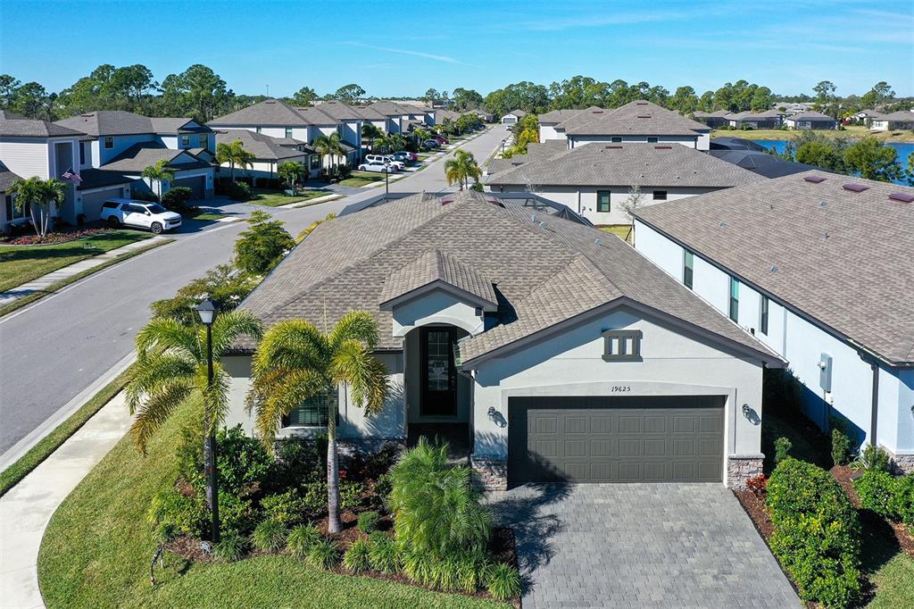 19625 Fishhawk Trail Venice, FL 34293 - Photo 2 of 38 an aerial view of a house with a yard