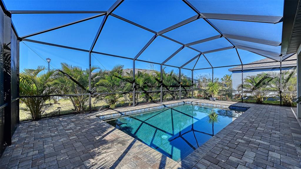 19625 Fishhawk Trail Venice, FL 34293 - Photo 24 of 38 a view of a backyard with sitting area