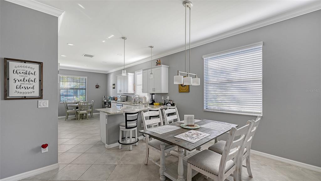 19625 Fishhawk Trail Venice, FL 34293 - Photo 9 of 38 a view of a dining room with furniture