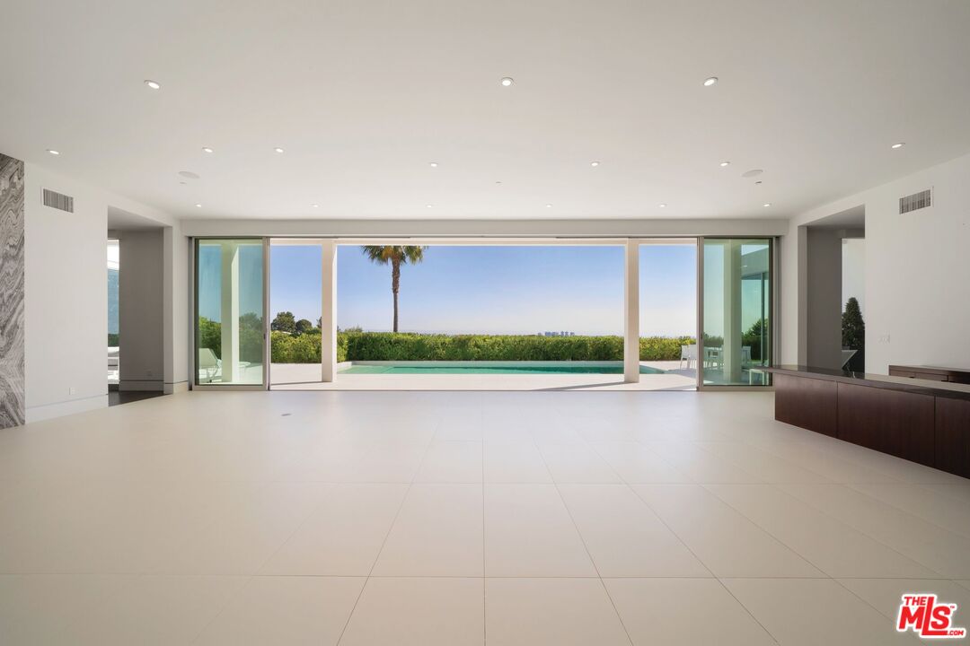 1115 Wallace Ridge Beverly Hills, CA 90210 - Photo 7 of 8 a view of a patio with a yard