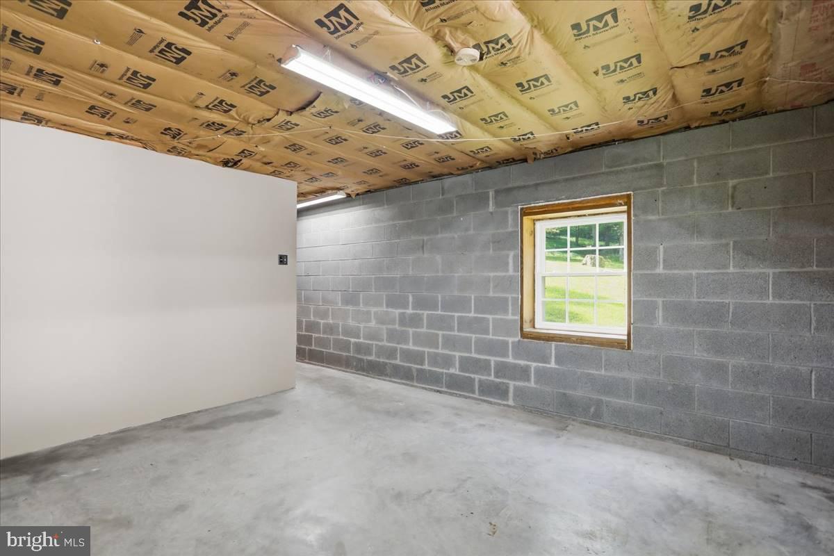 24105 Raven Rock Road Smithsburg, MD 21783 - Photo 30 of 51 Spacious unfinished room with natural light.
