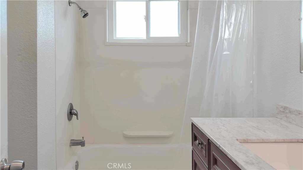 1724 Crofton Lane Escondido, CA 92027 - Photo 11 of 22 a bathroom with a granite countertop sink and vanity