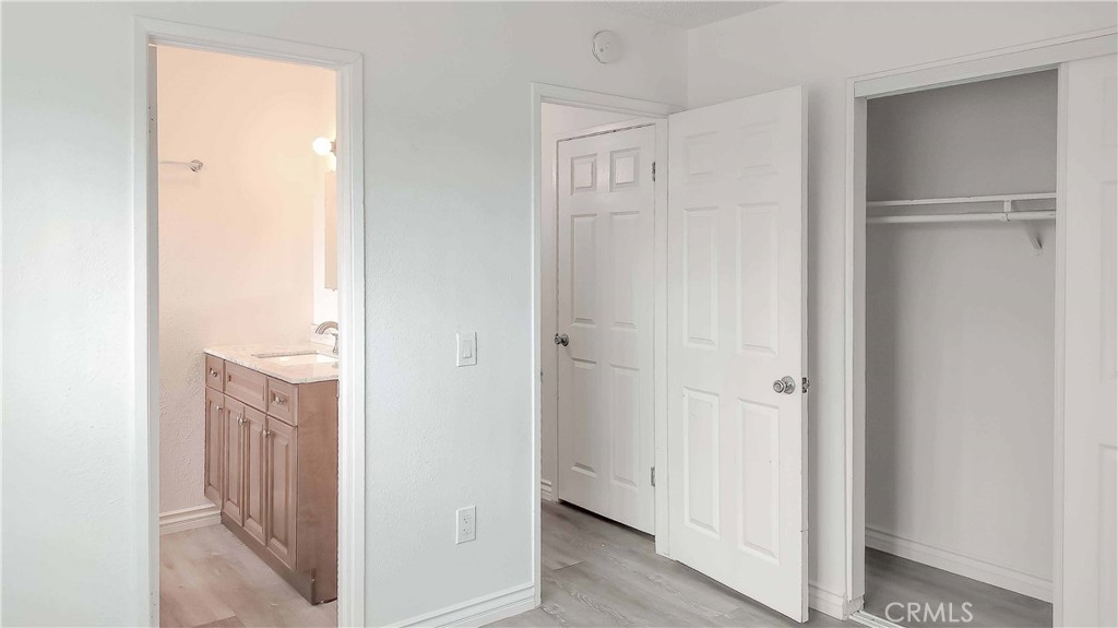 1724 Crofton Lane Escondido, CA 92027 - Photo 19 of 22 a view of a bathroom from a hallway