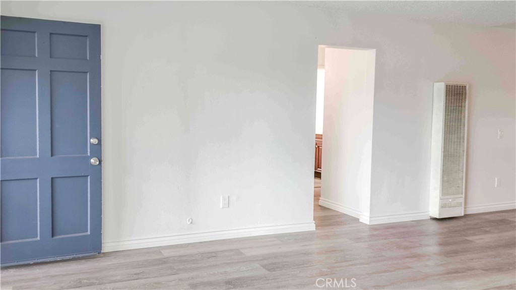 1724 Crofton Lane Escondido, CA 92027 - Photo 4 of 22 a view of an empty room with wooden floor