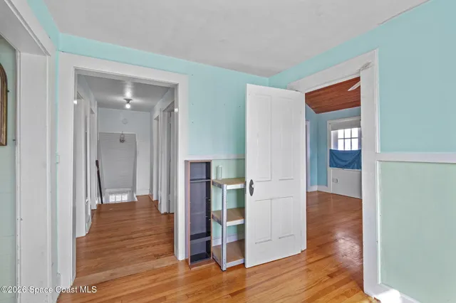 a view of entryway with wooden floor