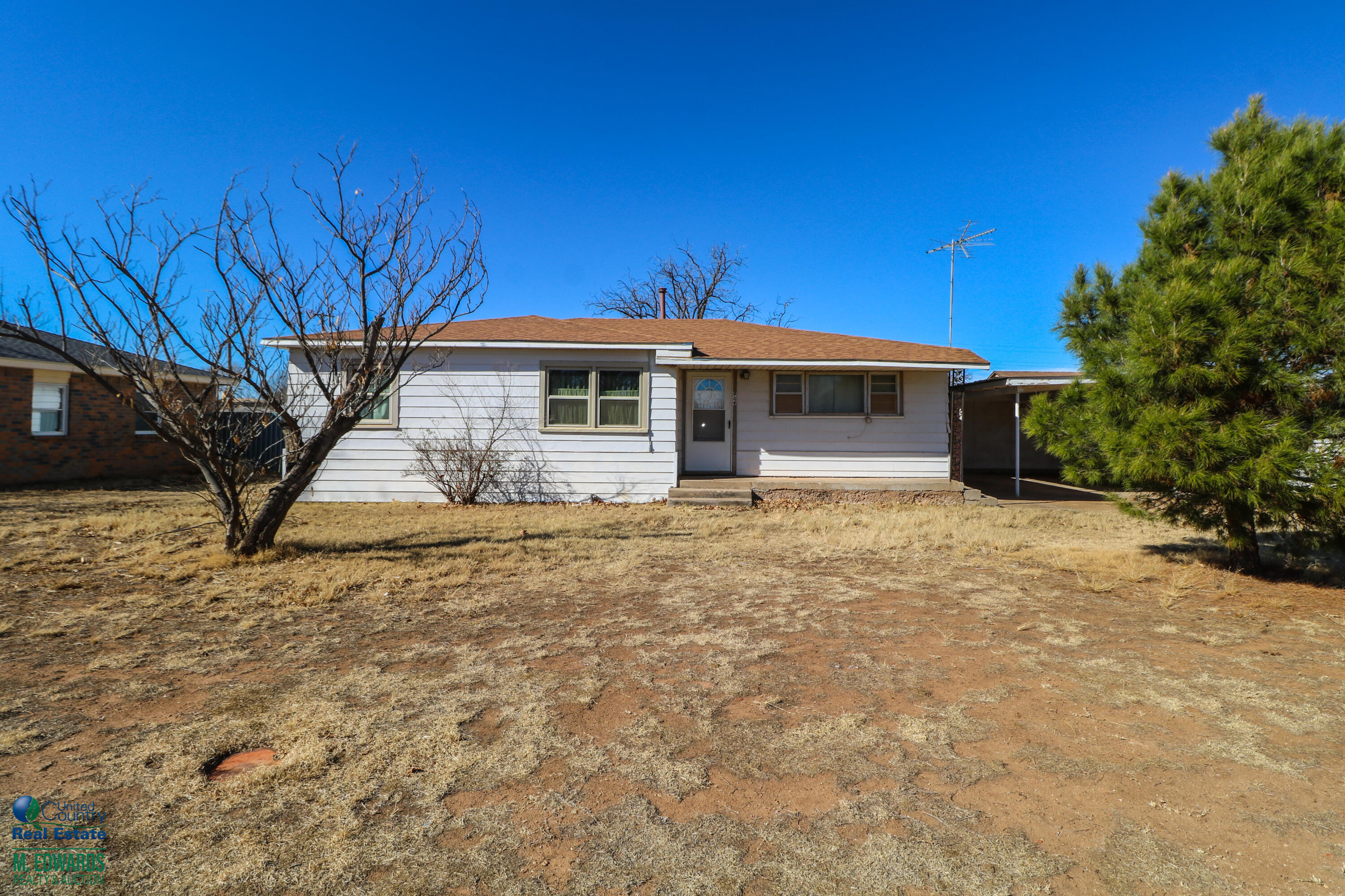 404 Wilson Street Sudan, TX 79371 - Photo 1 of 10 a front view of a house with a yard