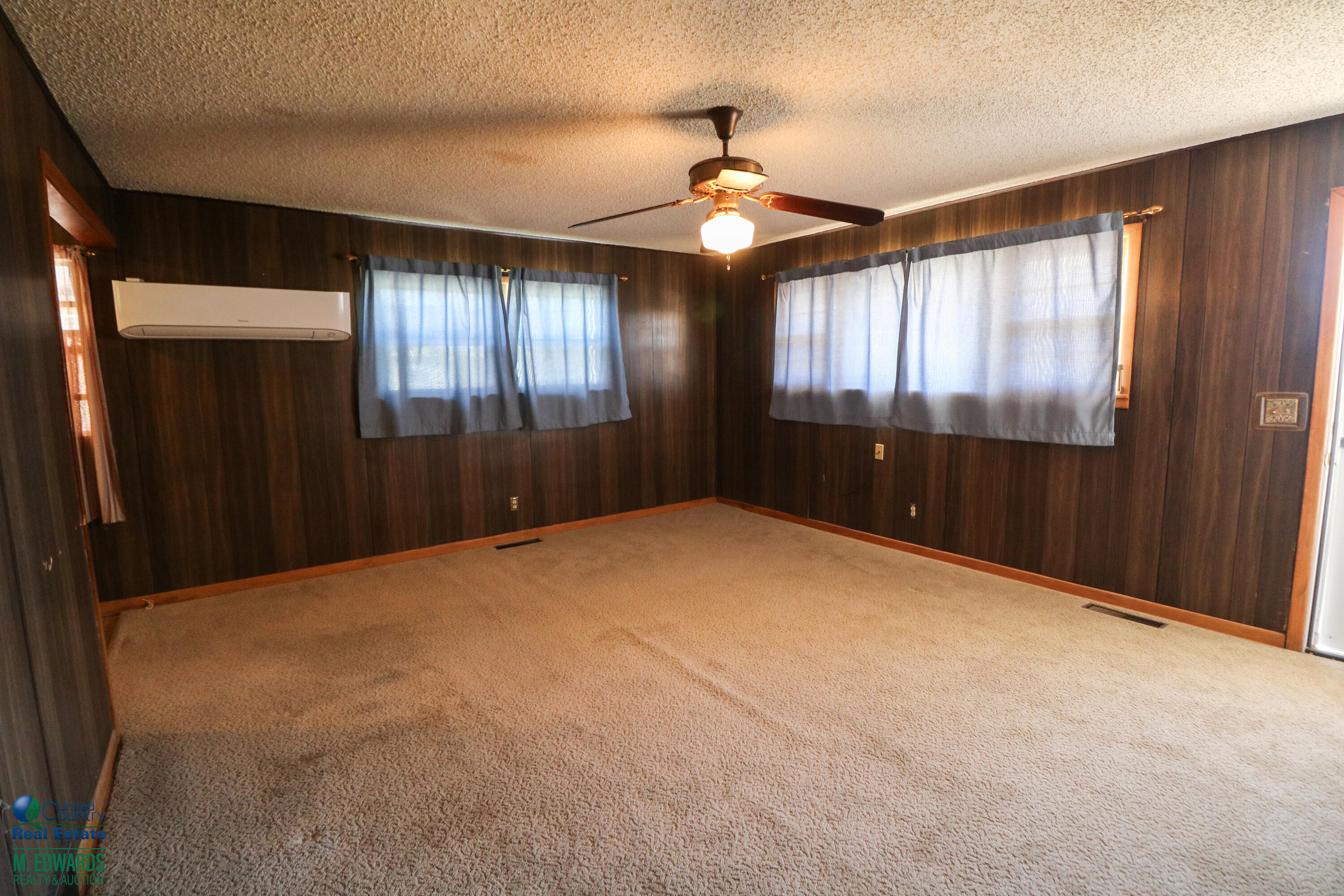 404 Wilson Street Sudan, TX 79371 - Photo 4 of 10 a view of an empty room with a window