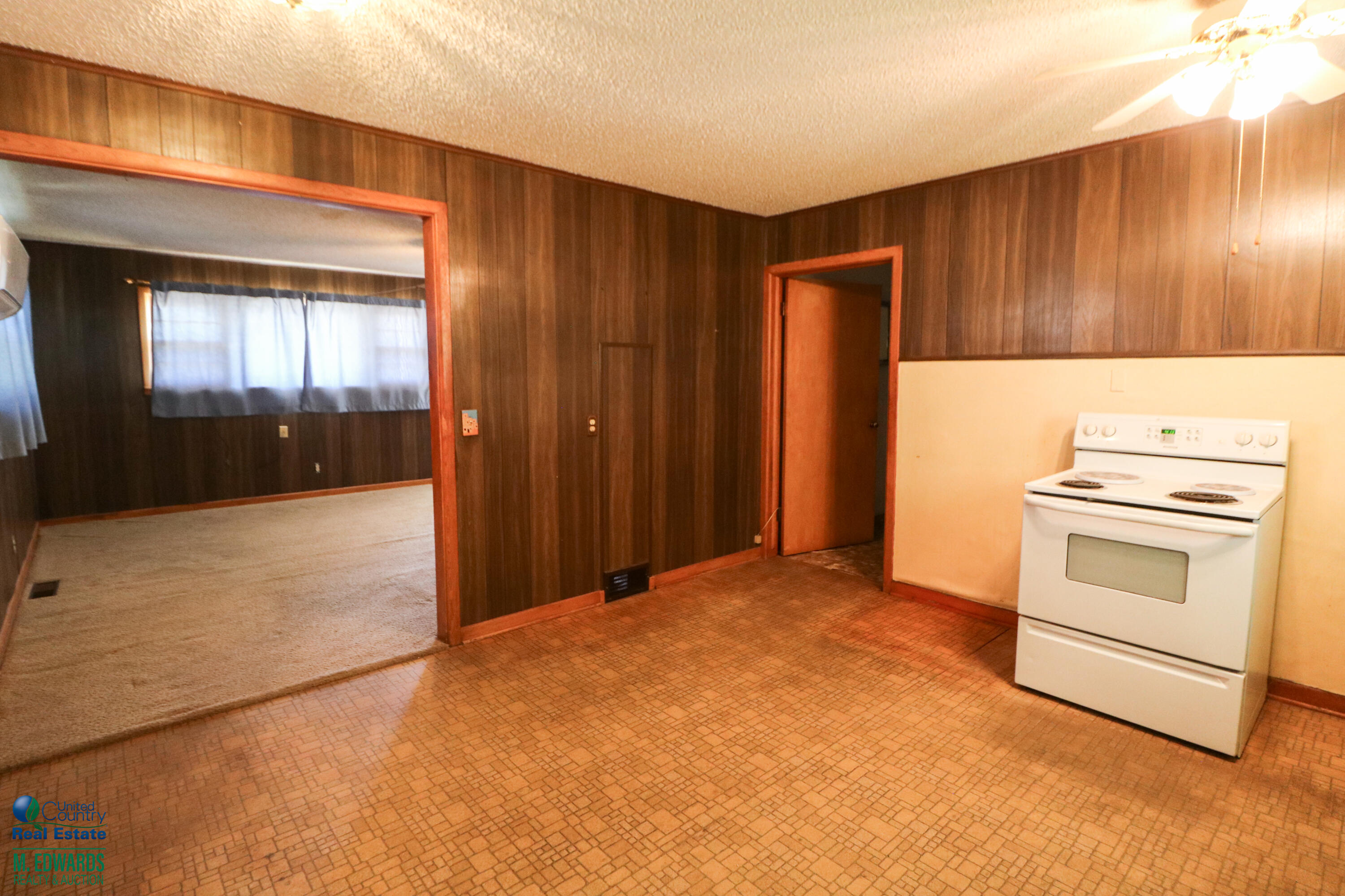 404 Wilson Street Sudan, TX 79371 - Photo 5 of 10 a view of a kitchen with a sink and cabinets