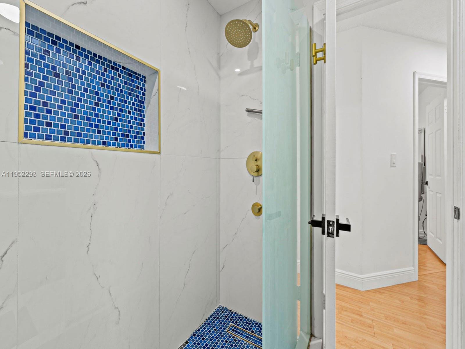 15626 Southwest 100th Terrace Miami, FL 33196 - Photo 27 of 30 a bathroom with a shower