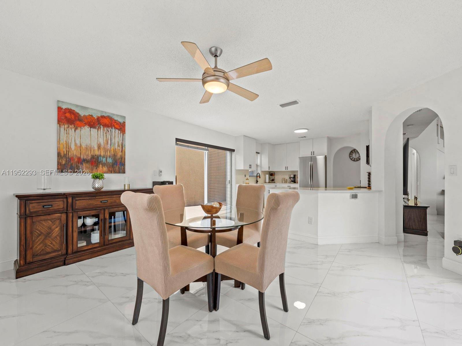 15626 Southwest 100th Terrace Miami, FL 33196 - Photo 7 of 30 a dining room with furniture and window