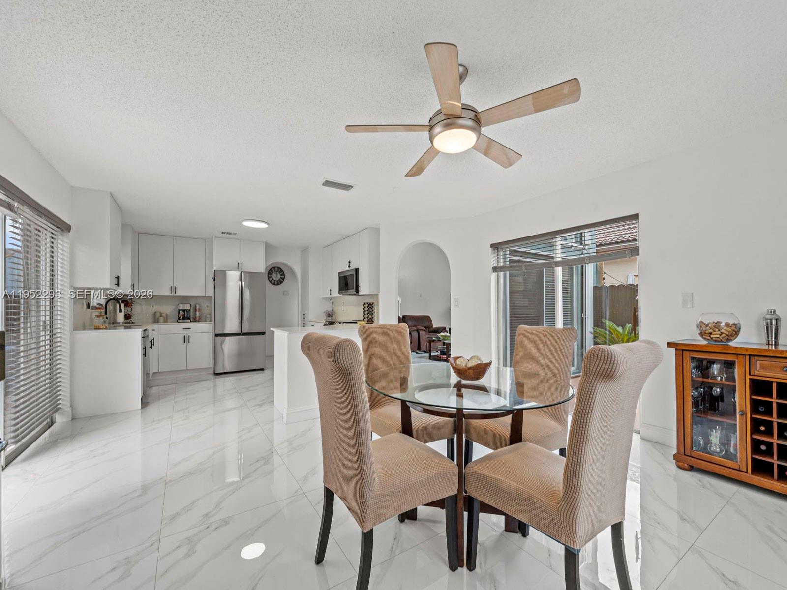 15626 Southwest 100th Terrace Miami, FL 33196 - Photo 8 of 30 a dining room with furniture and window