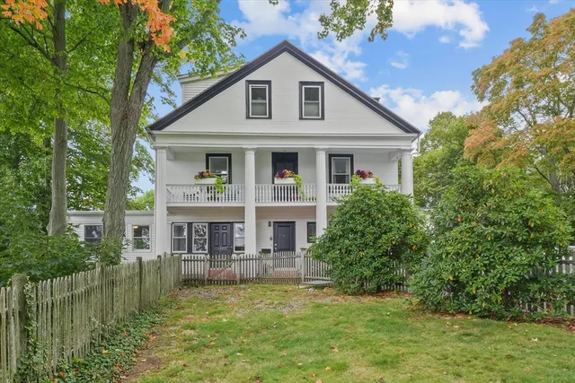 a house with river in front of it