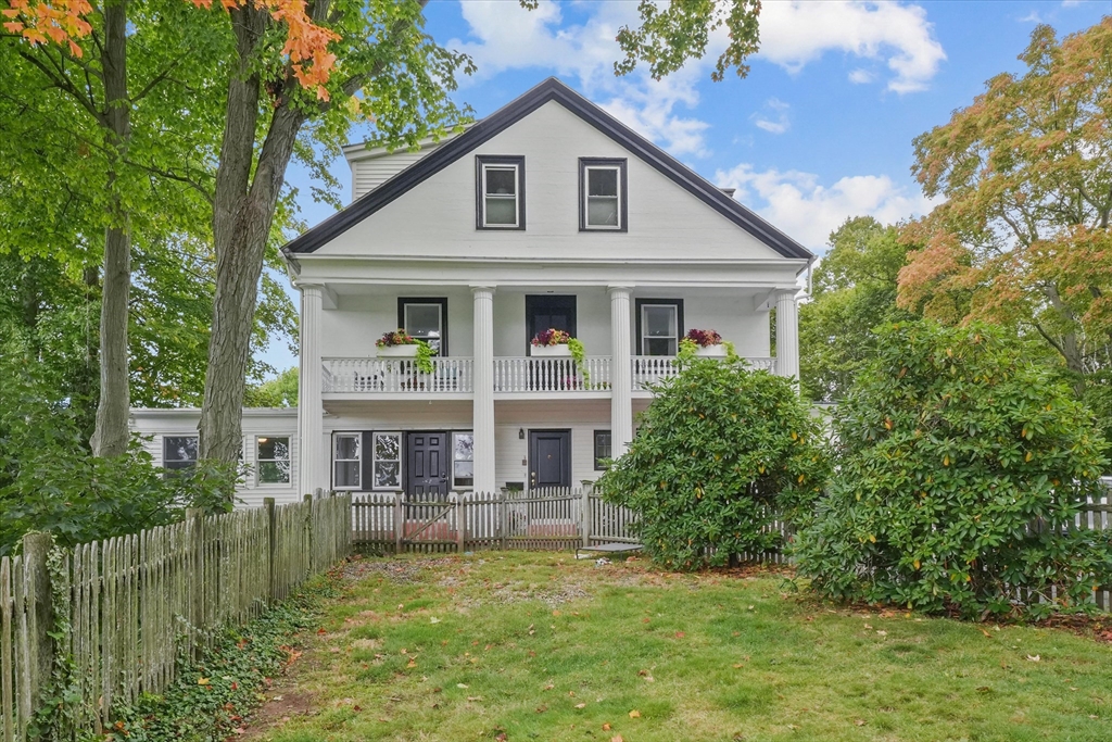 a house with river in front of it