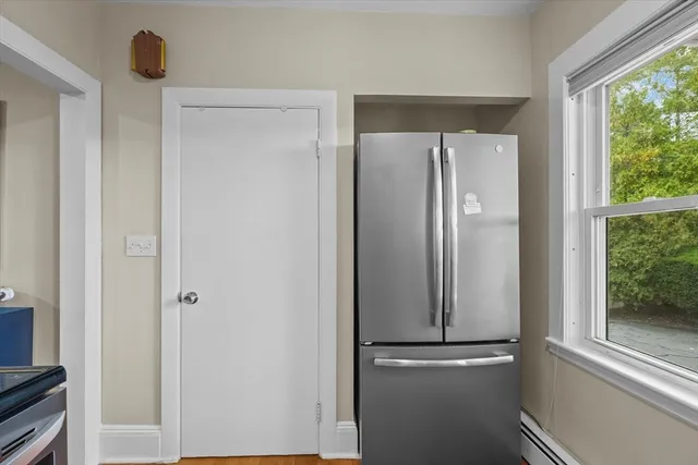 a view of walk in closet with window