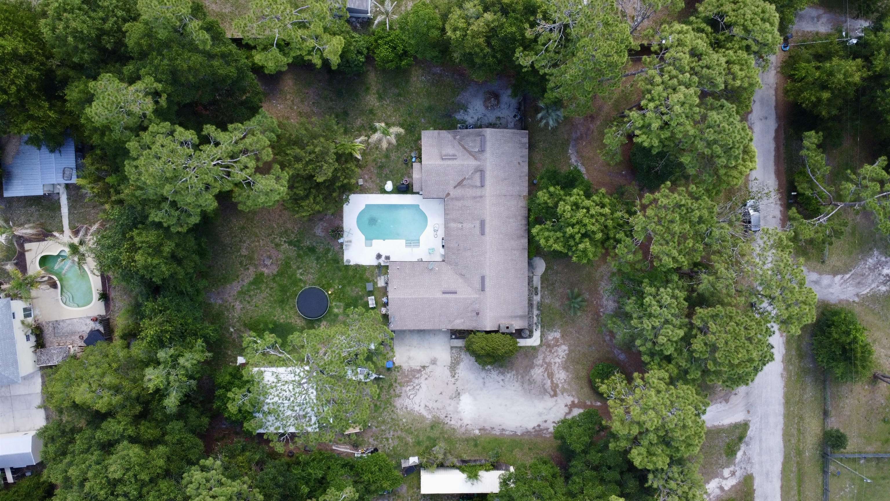 554 Hayley Road St. Augustine, FL 32086 - Photo 41 of 46 an aerial view of a house with outdoor space and lake view