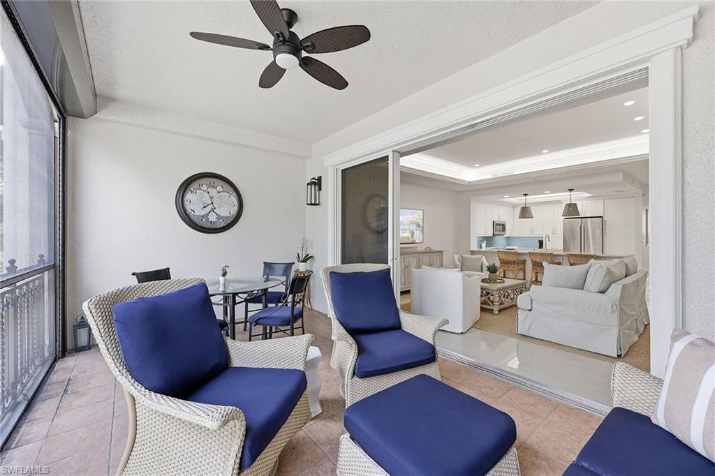 411 6th Street South, Unit 202 Naples, FL 34102 - Photo 32 of 37 a living room with furniture
