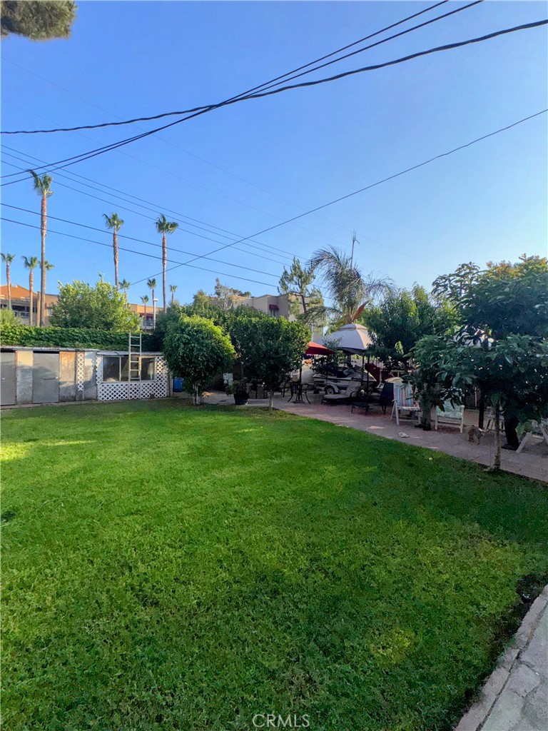 9778 Sharon Avenue Riverside, CA 92503 - Photo 4 of 19 a view of a house with a backyard