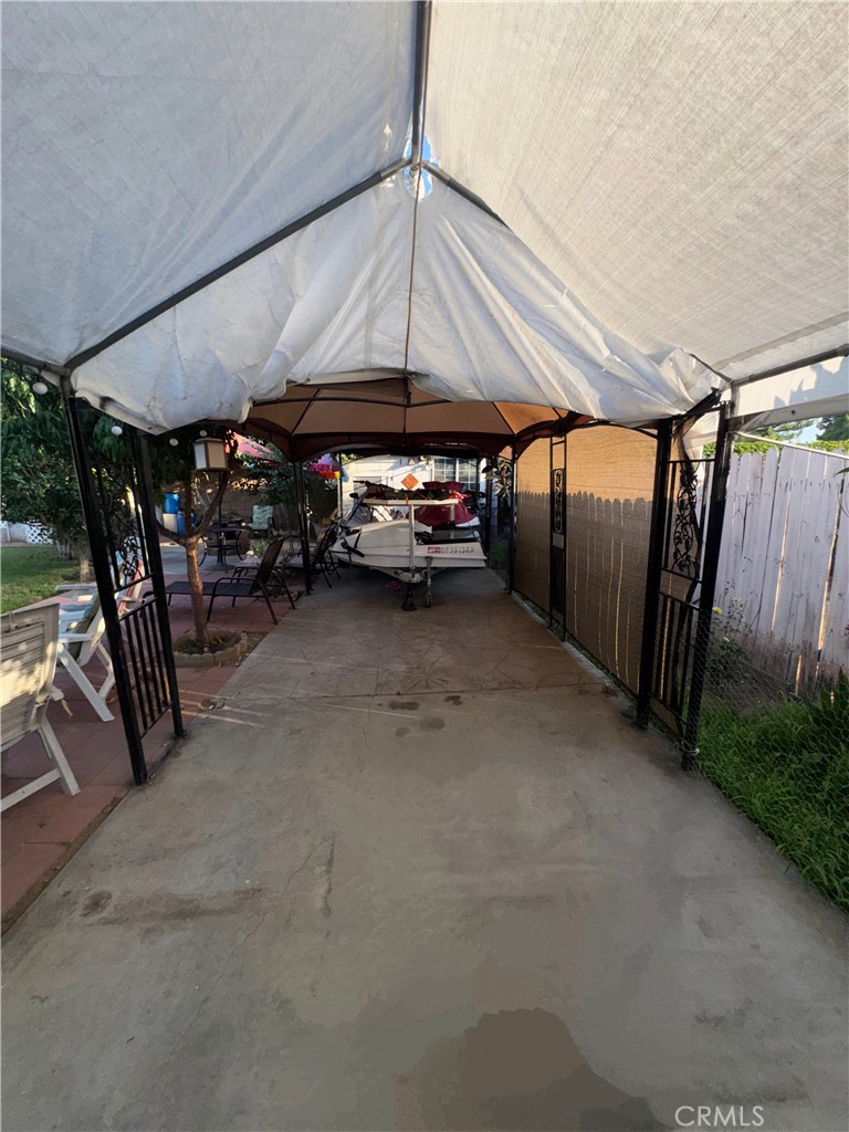 9778 Sharon Avenue Riverside, CA 92503 - Photo 5 of 19 a view of a big room with lots of car parked