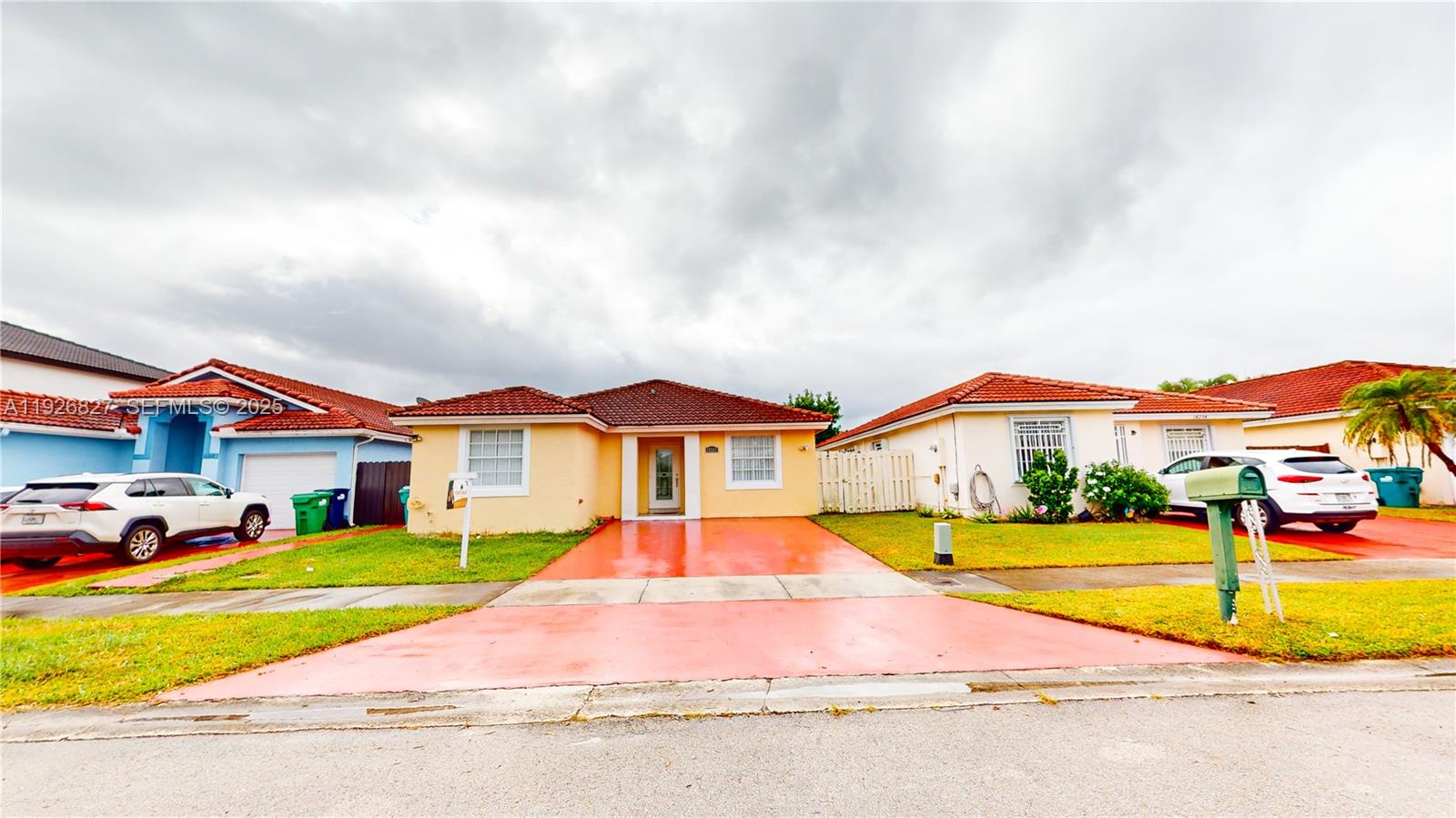 a house with swimming pool in front of it
