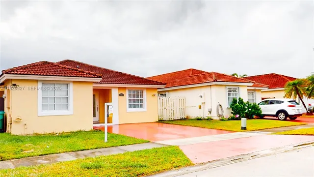 a view of a house with a swimming pool