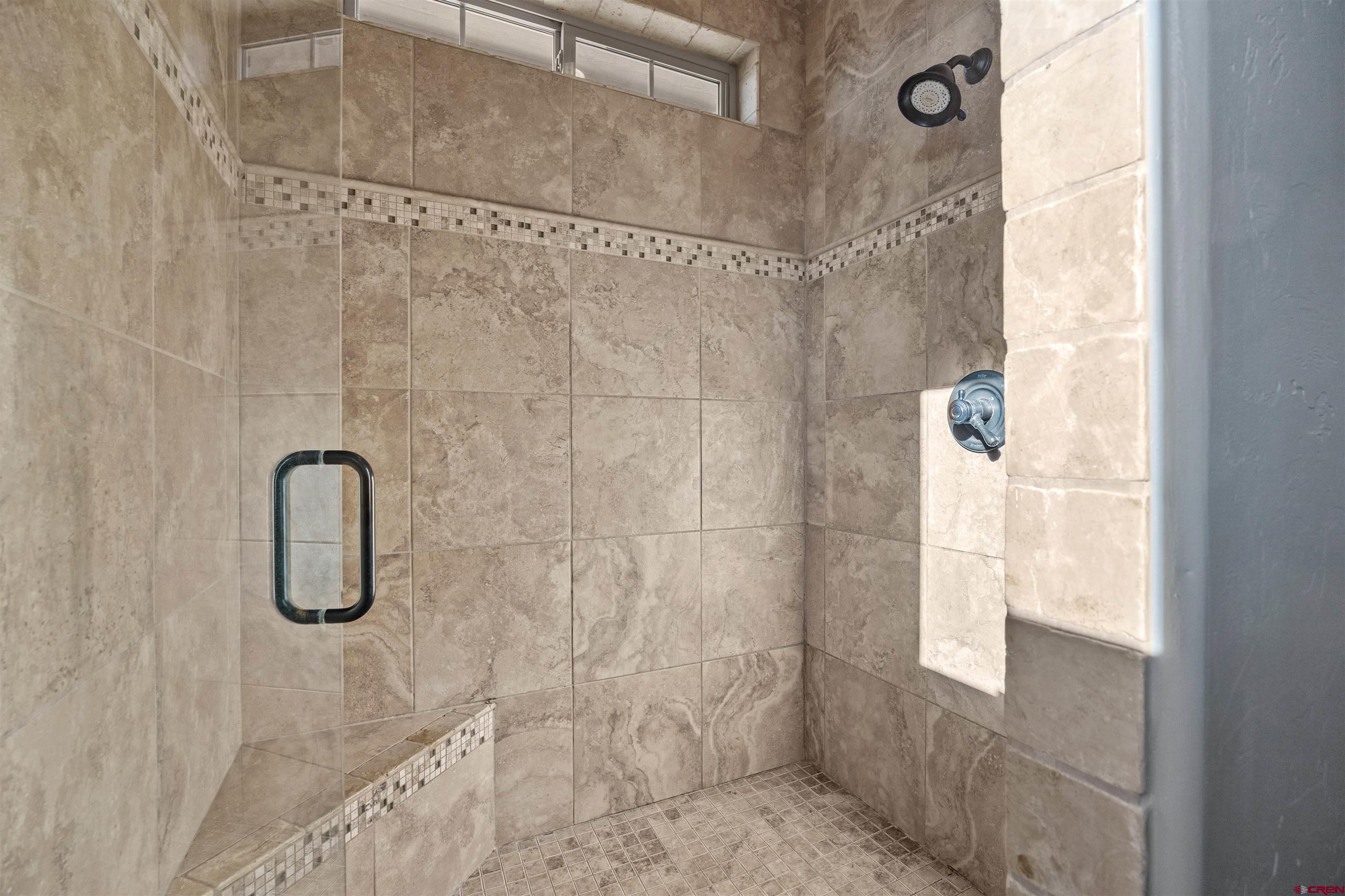 9838 5650th Road Olathe, CO 81425 - Photo 12 of 44 a bathroom with shower