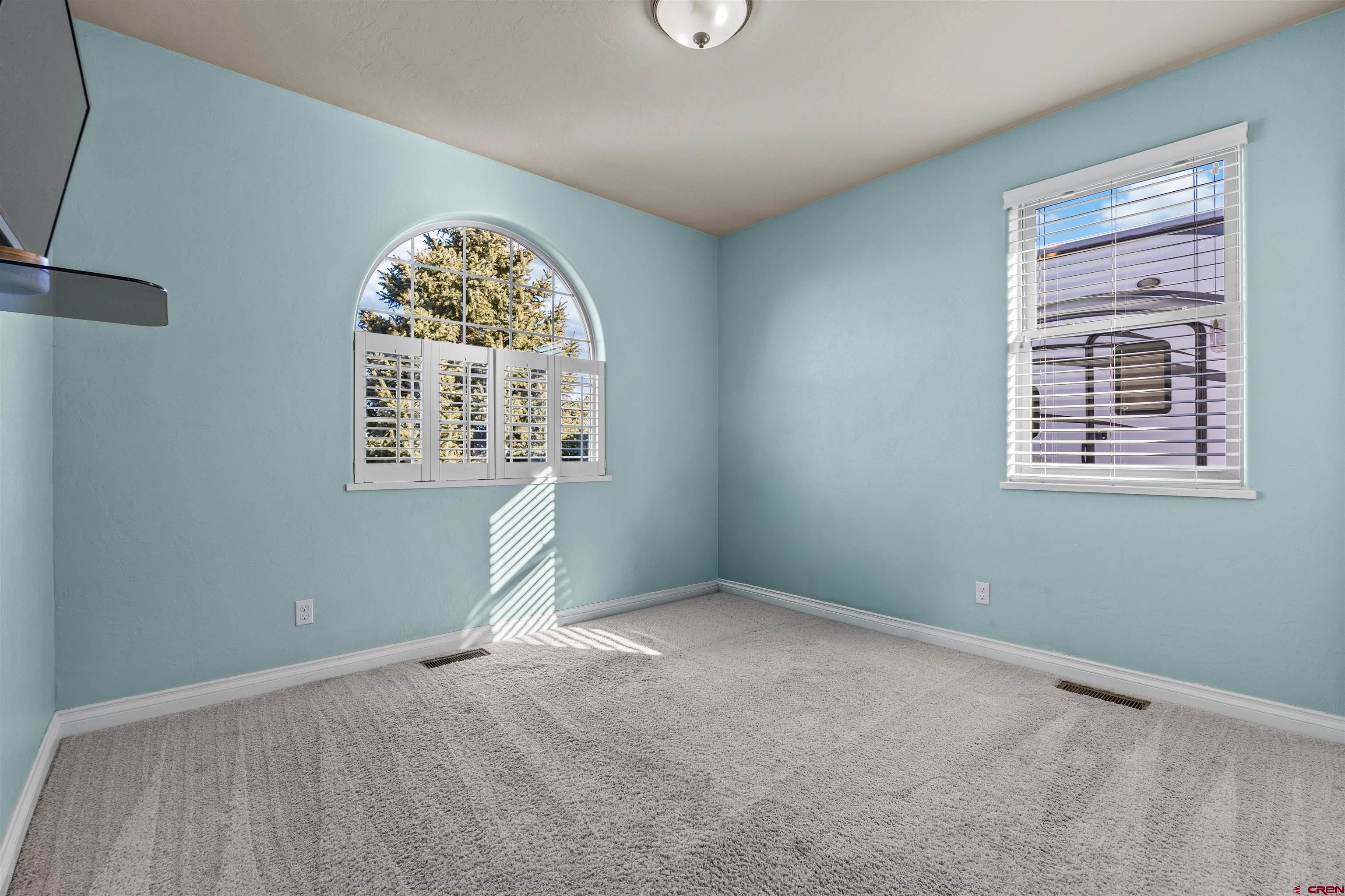 9838 5650th Road Olathe, CO 81425 - Photo 14 of 44 an empty room with a window