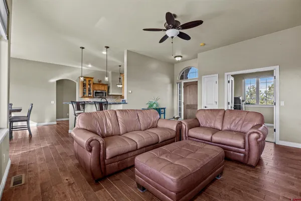 a view of a backyard with sitting area