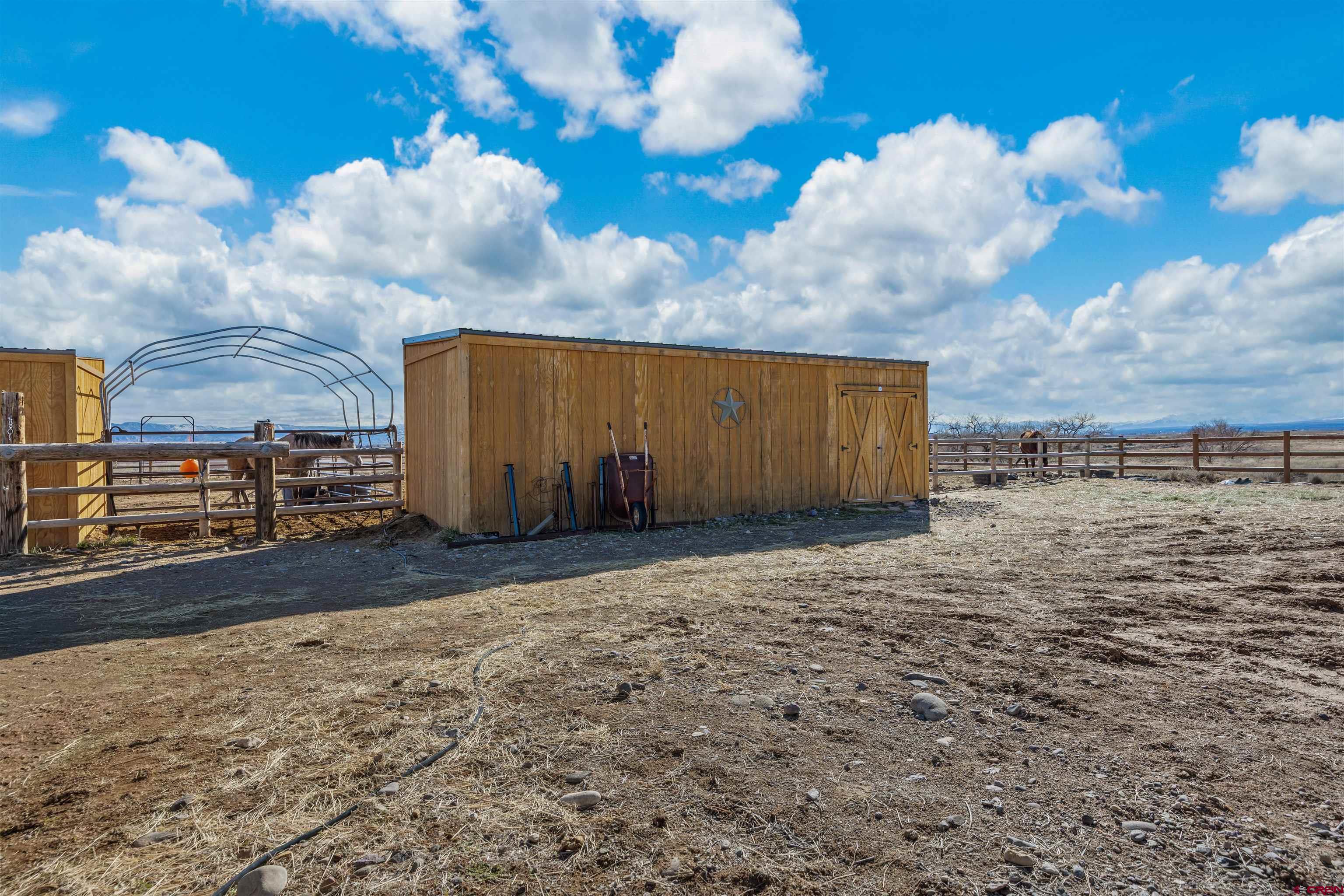 9838 5650th Road Olathe, CO 81425 - Photo 33 of 44 a backyard of a house