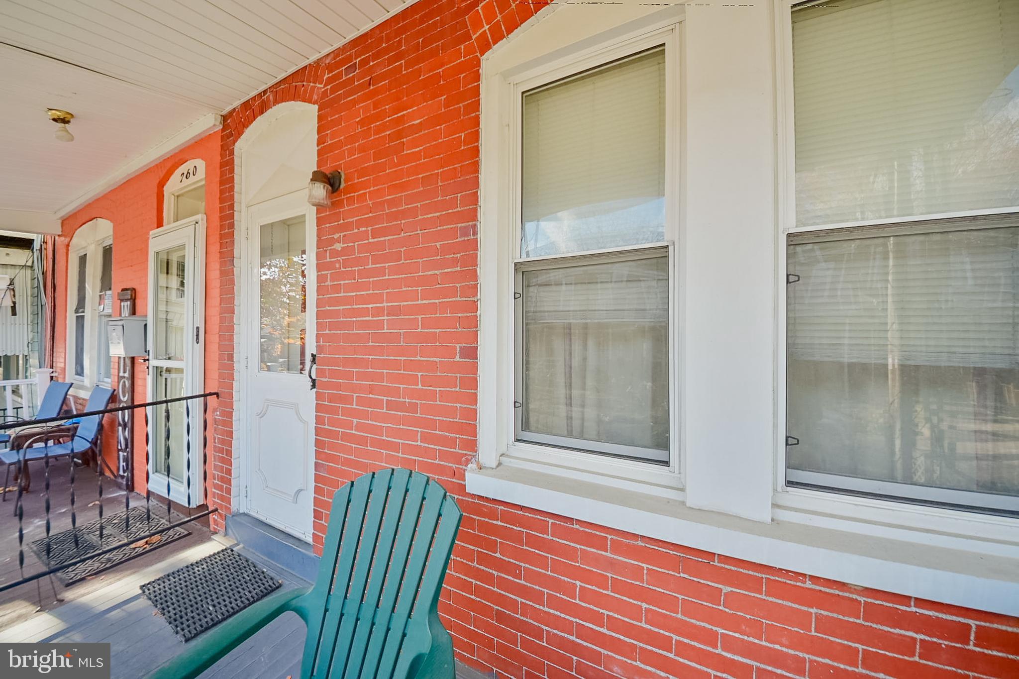 758 South Lime Street Lancaster, PA 17602 - Photo 20 of 28 a view of porch with a chair and floor to ceiling window