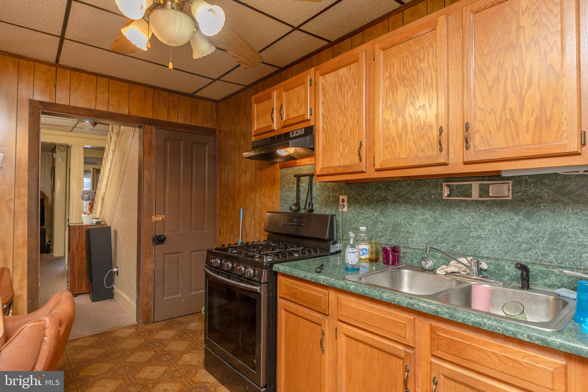 758 South Lime Street Lancaster, PA 17602 - Photo 10 of 28 a kitchen with granite countertop cabinets and stainless steel appliances