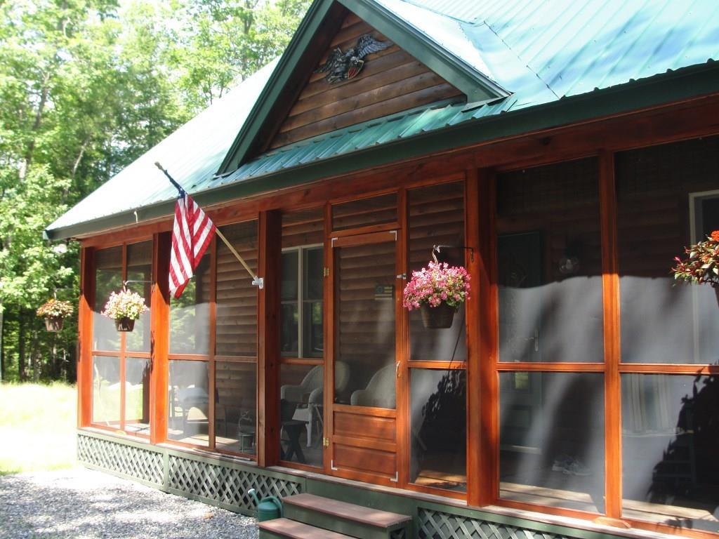 433 Sweden Road Bridgton, ME 04009 - Photo 2 of 21 New screened porch adds lots of room...
