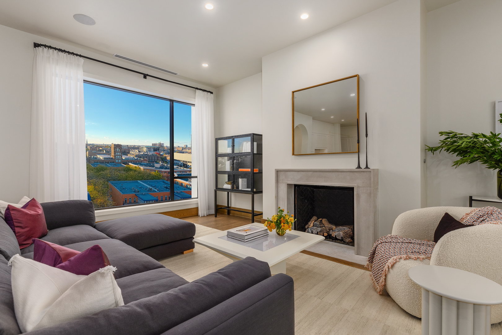 21 North May Street, Unit 1302 Chicago, IL 60607 - Photo 11 of 25 a living room with furniture and a fireplace