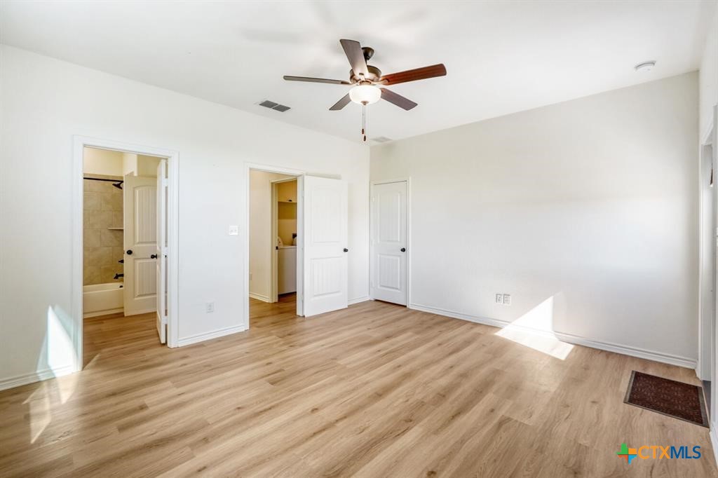 1642 Scull Road San Marcos, TX 78666 - Photo 22 of 31 Private bedroom with separate exterior entrance—ideal for guests or multi-generational living.