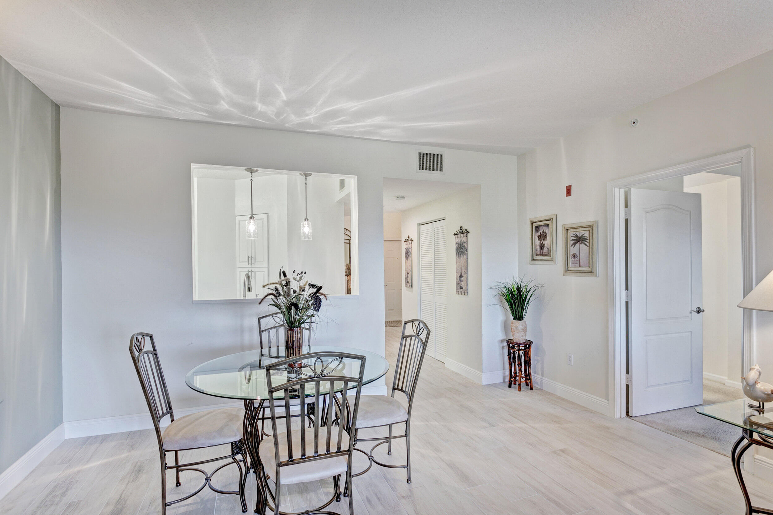 500 Uno Lago Drive, Unit 402 Juno Beach, FL 33408 - Photo 12 of 36 Dining Area