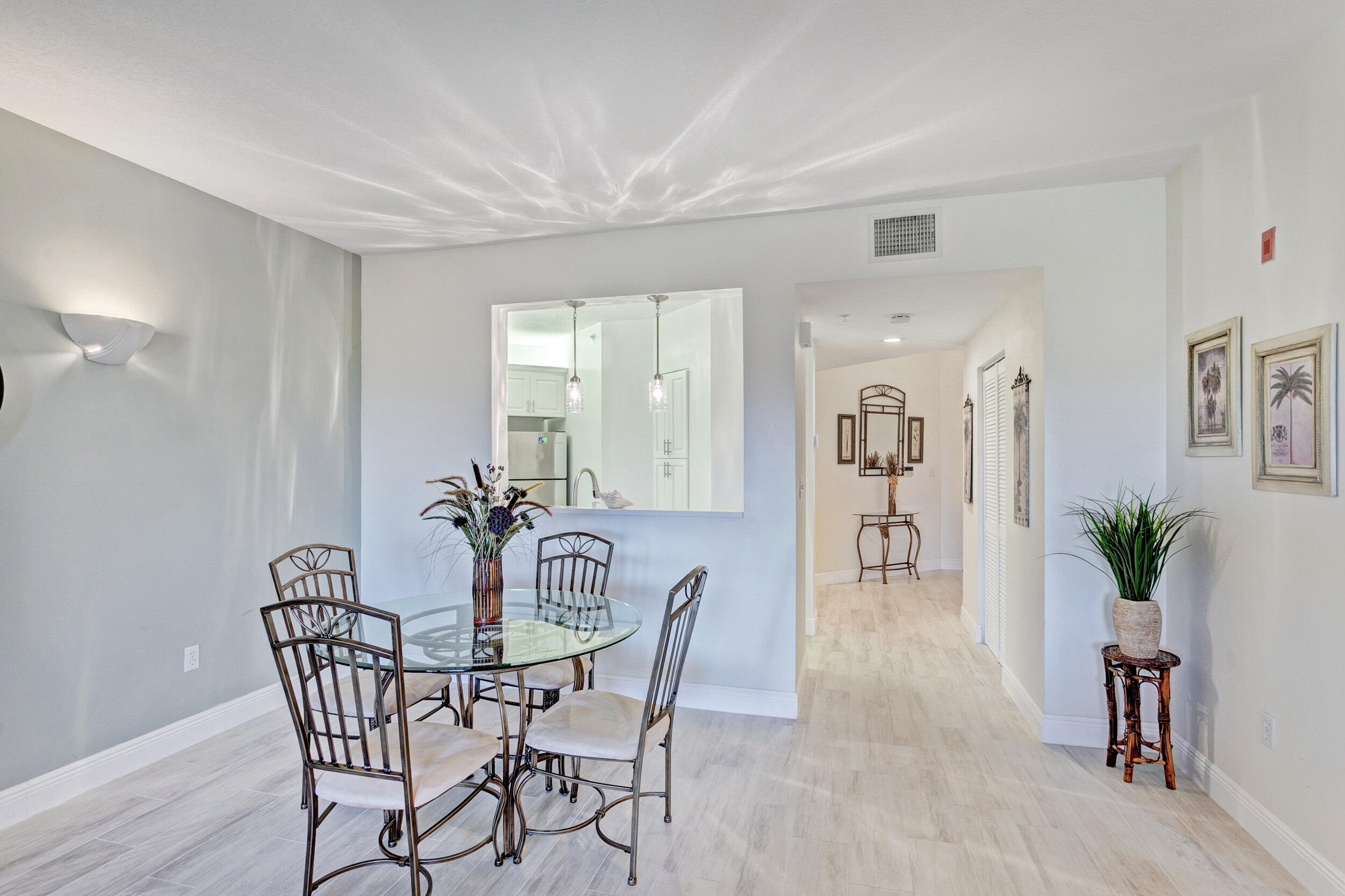 500 Uno Lago Drive, Unit 402 Juno Beach, FL 33408 - Photo 13 of 36 Dining Area