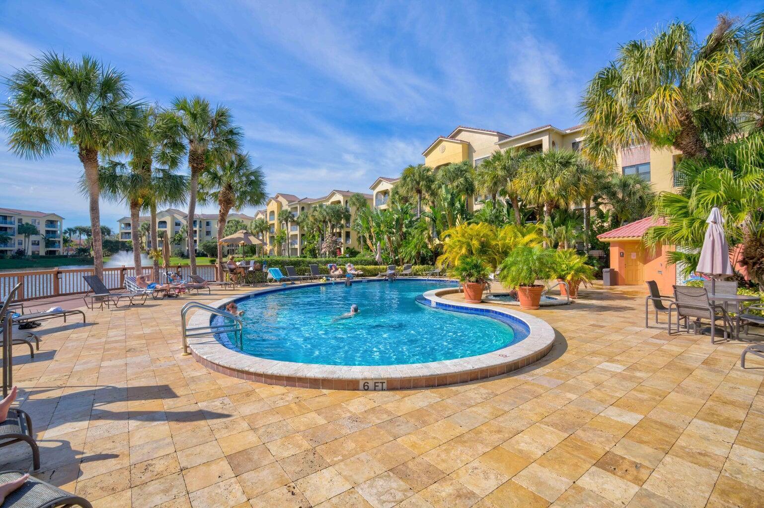 500 Uno Lago Drive, Unit 402 Juno Beach, FL 33408 - Photo 31 of 36 Lagoon Pool