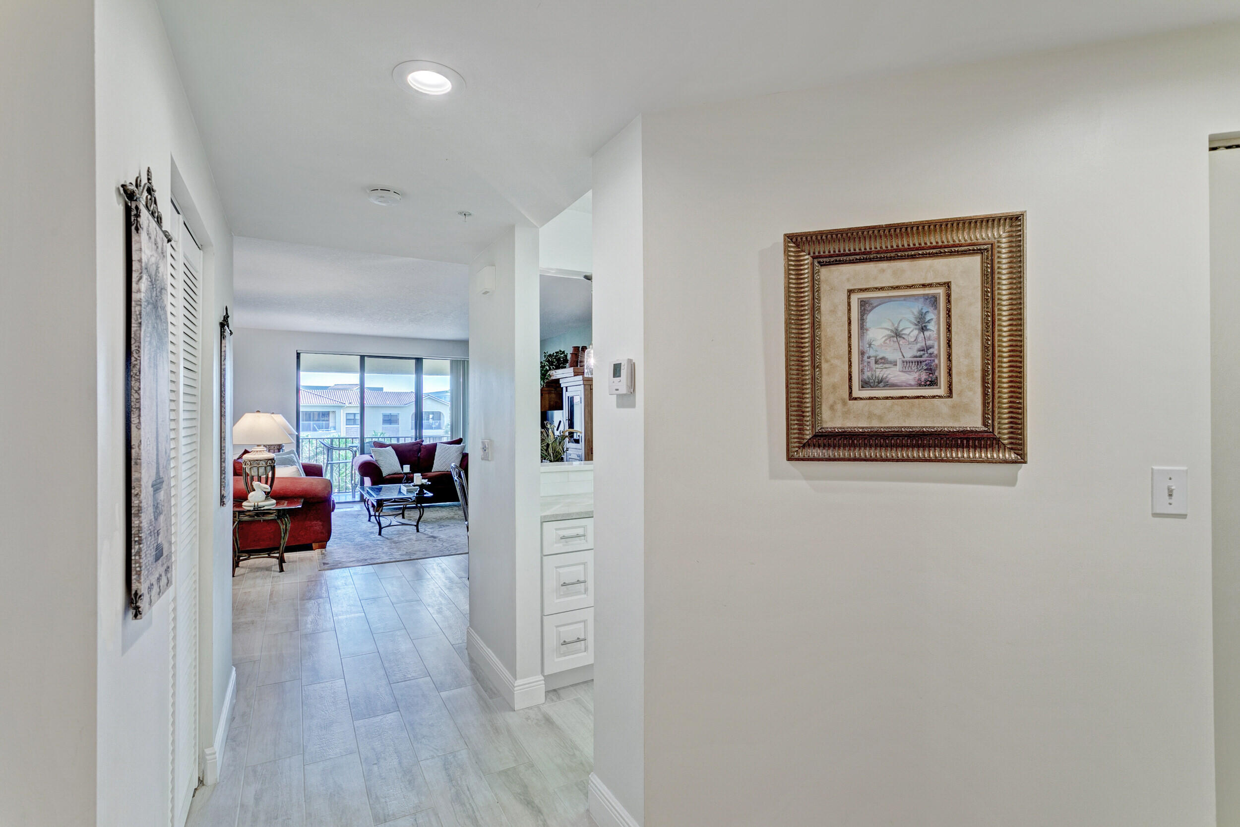500 Uno Lago Drive, Unit 402 Juno Beach, FL 33408 - Photo 6 of 36 Entryway