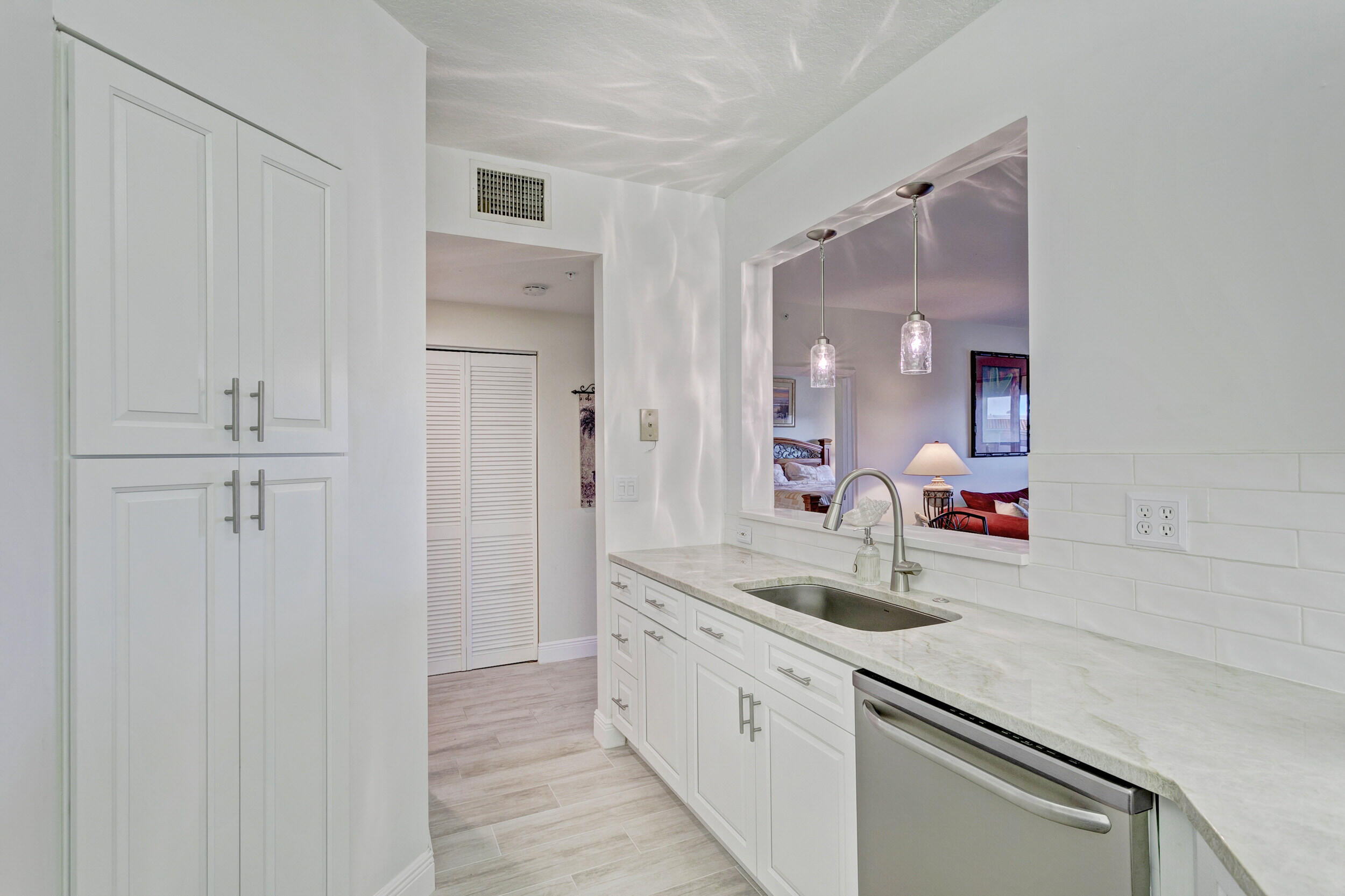 500 Uno Lago Drive, Unit 402 Juno Beach, FL 33408 - Photo 9 of 36 Kitchen