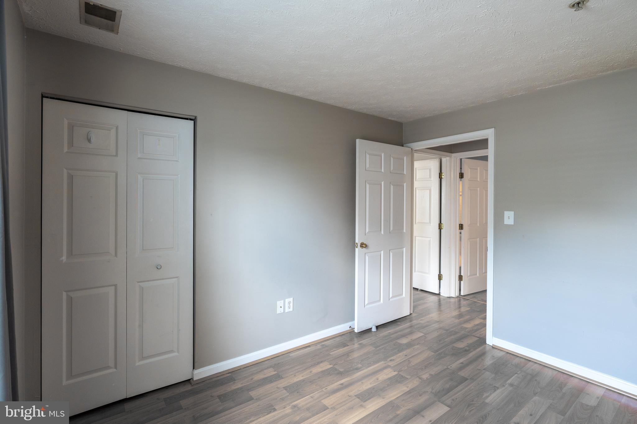 689 Winding Stream Way, Unit 101 Odenton, MD 21113 - Photo 13 of 23 a view of an empty room