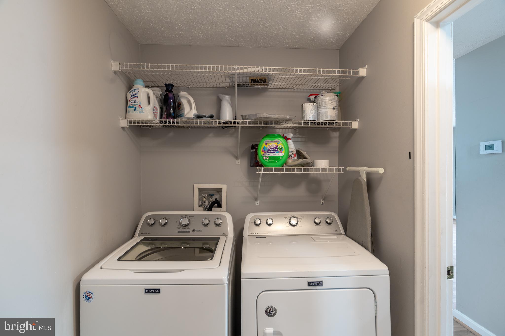 689 Winding Stream Way, Unit 101 Odenton, MD 21113 - Photo 21 of 23 a view of washer and dryer in a utility room