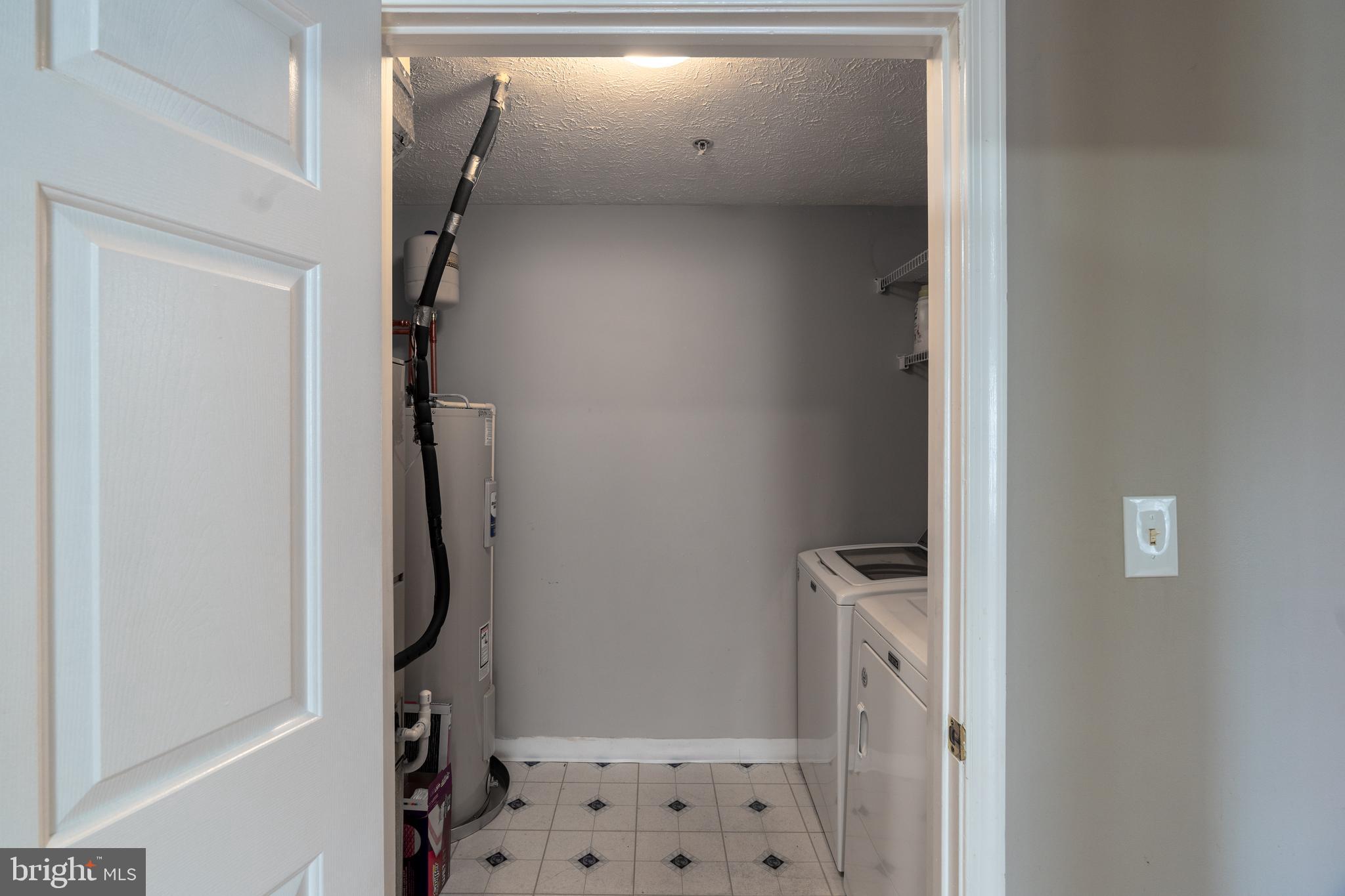 689 Winding Stream Way, Unit 101 Odenton, MD 21113 - Photo 22 of 23 a view of walk in closet