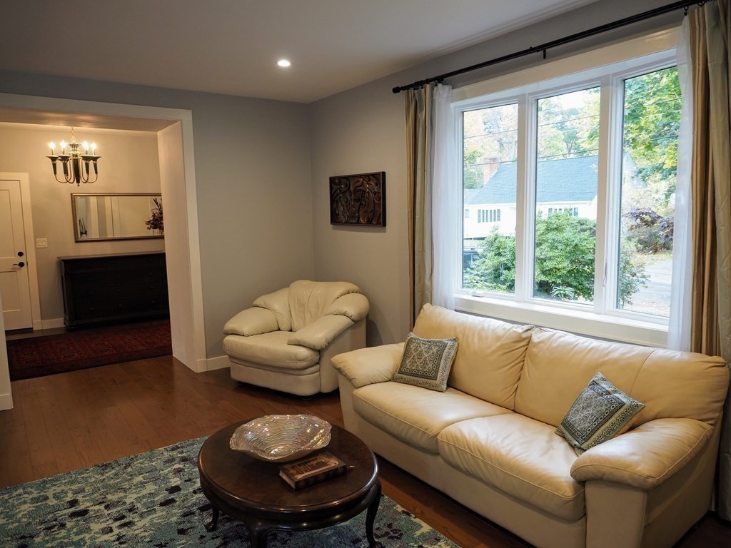 9 York Road Newton, MA 02468 - Photo 13 of 41 a living room with furniture and a large window