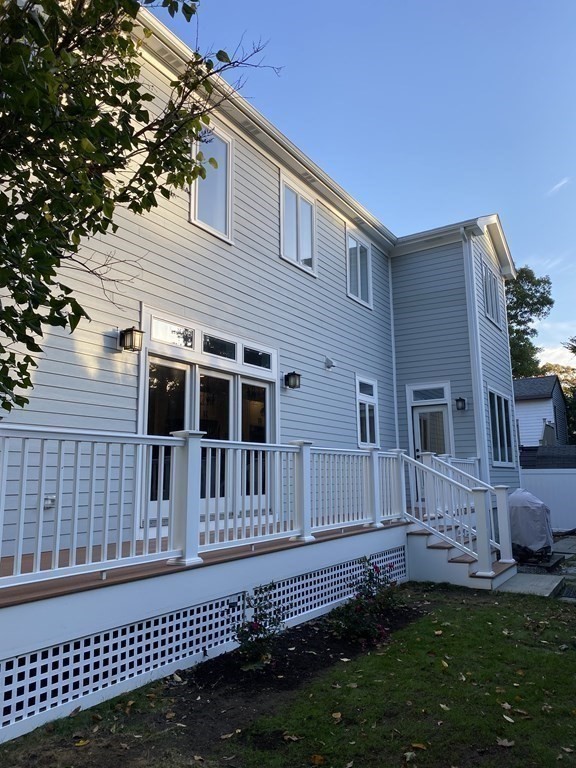 9 York Road Newton, MA 02468 - Photo 2 of 41 a house view with a garden space