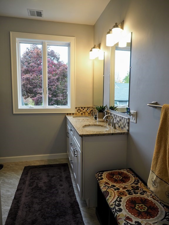 9 York Road Newton, MA 02468 - Photo 26 of 41 a bathroom with a sink and a window