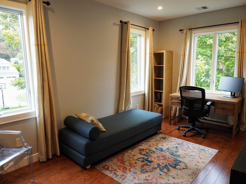 9 York Road Newton, MA 02468 - Photo 27 of 41 a living room with furniture and a rug