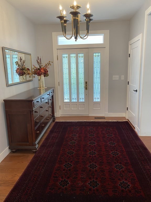 9 York Road Newton, MA 02468 - Photo 3 of 41 a view of a room with wooden floor fireplace and windows
