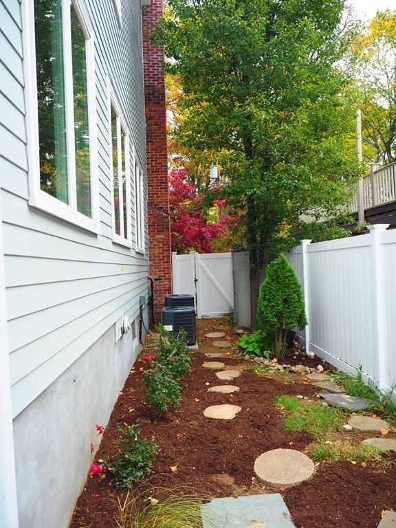 9 York Road Newton, MA 02468 - Photo 34 of 41 a backyard of a house with lots of green space