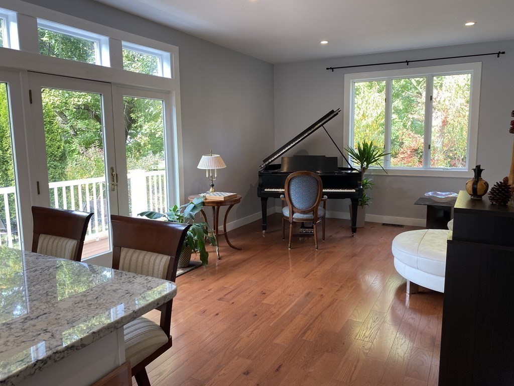 9 York Road Newton, MA 02468 - Photo 5 of 41 a living room with furniture and a large window