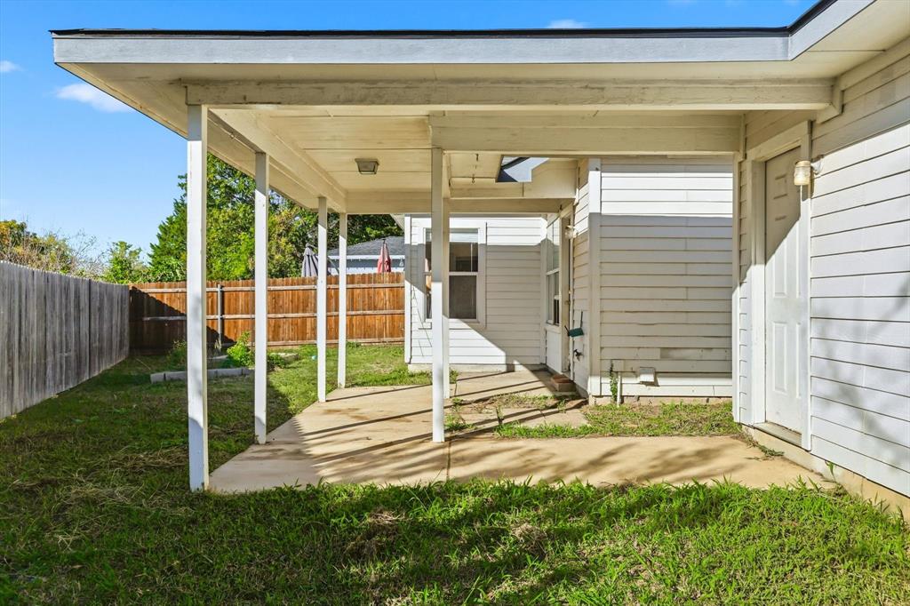 801 Indigo Terrace Denton, TX 76209 - Photo 35 of 40 a view of a house with backyard and porch